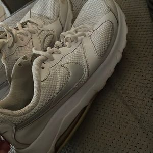 White and gray Nike sneaker